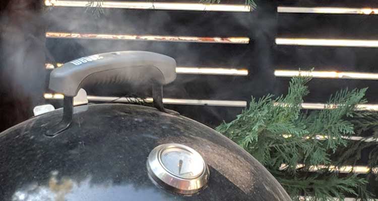 How to control temperature on charcoal smoker