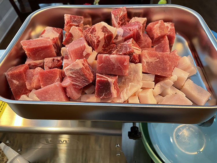LEM Big Bitemeat grinder with meat