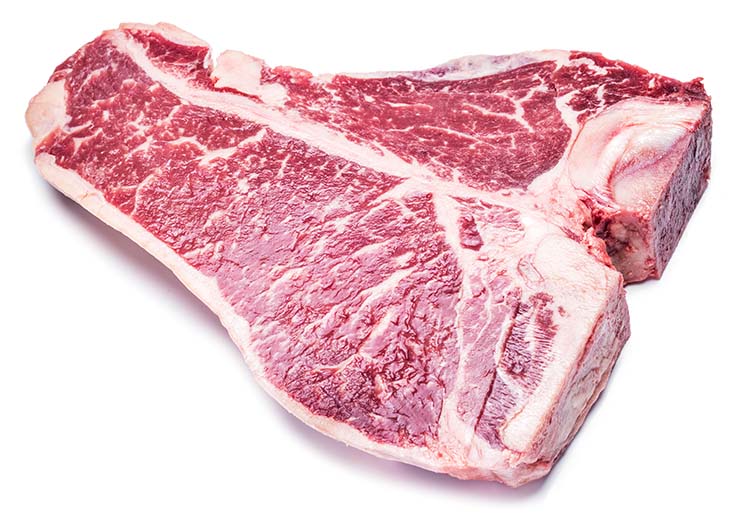 raw t-bone steak on a white background