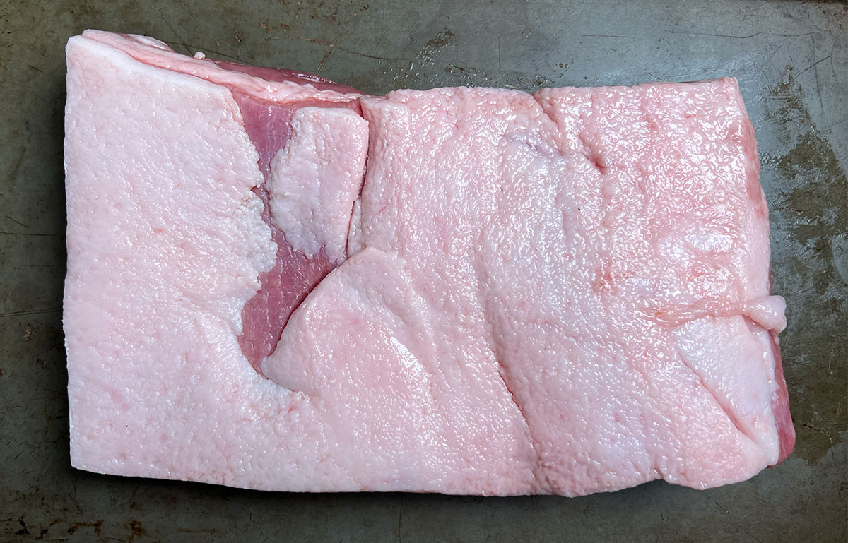 slab of raw pork belly fat side up