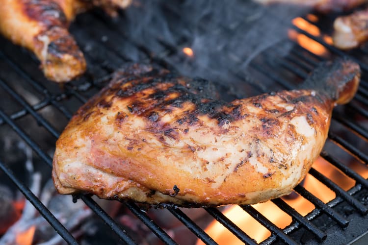 Chicken legs on a grill