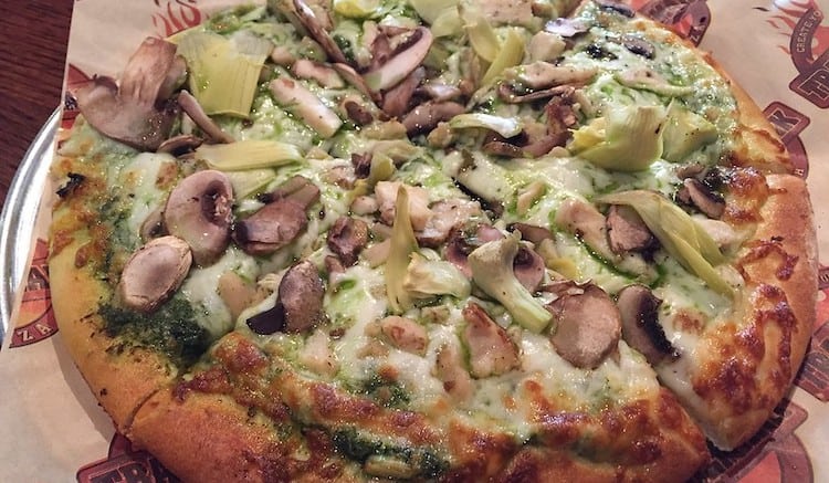 Pizza with onions and mushrooms