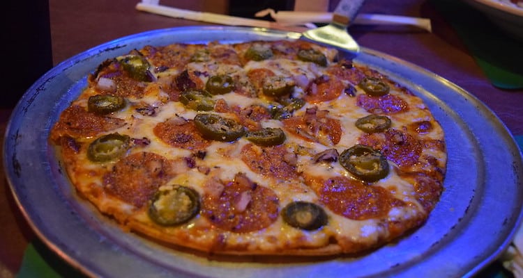 Whole pizza with pepperoni and jalapenos