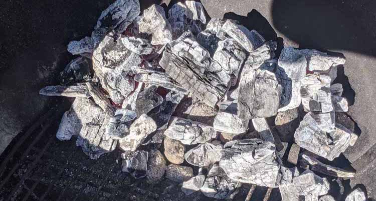 lump charcoal inside a grill