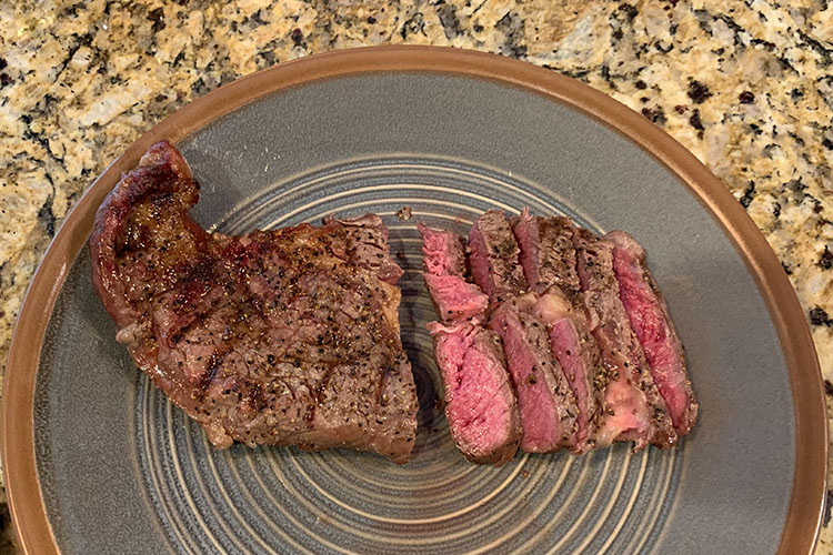 seared ribeye steak on a plate