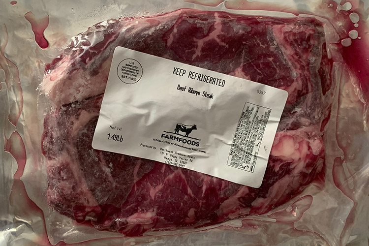 packaged uncooked ribeye steak from Farm Foods Market