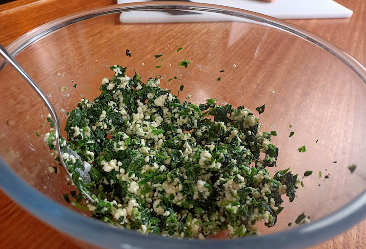 spinach and feta lamb stuffing in a bowl