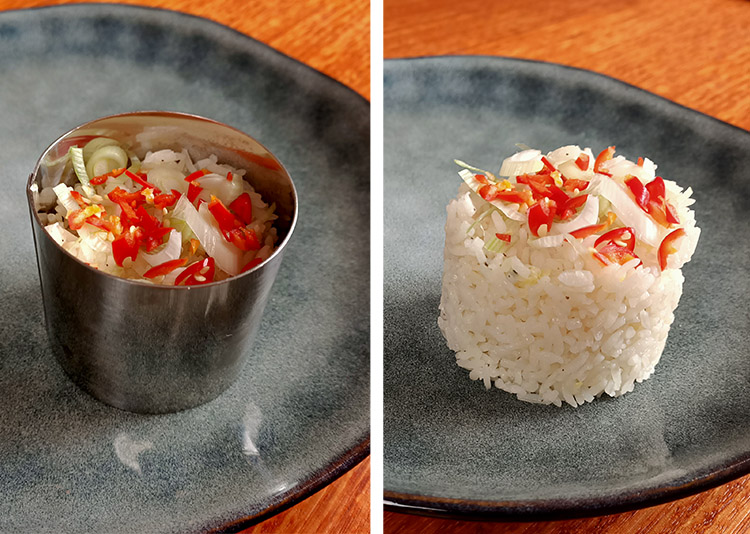 cooked jasmine rice garnished with chili and scallions