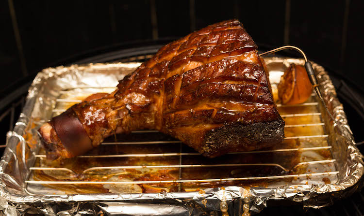 double smoked ham with glaze in a smoker