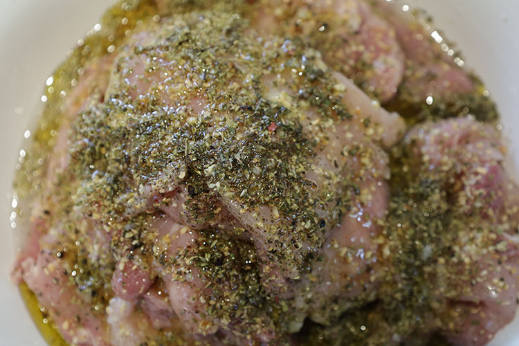 raw chicken slices in a marinade