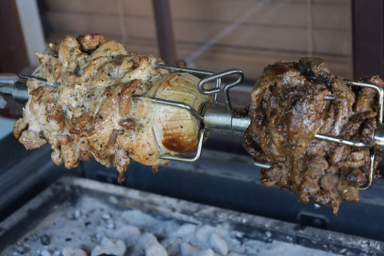 cooked slices of chicken and lamb shoulder for the chicken souvlaki and lamb gyros