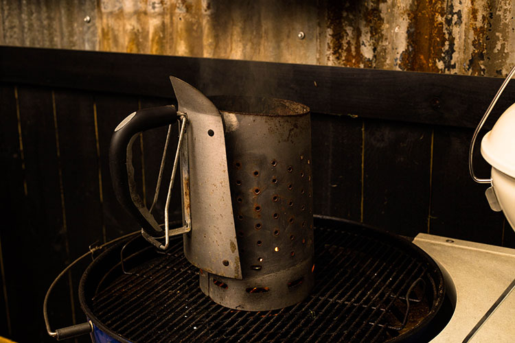 charcoal chimney starter on a weber smokey mountain