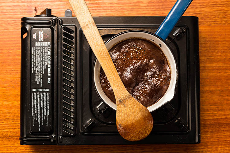 pomegranate sauce in a saucepan on the stove