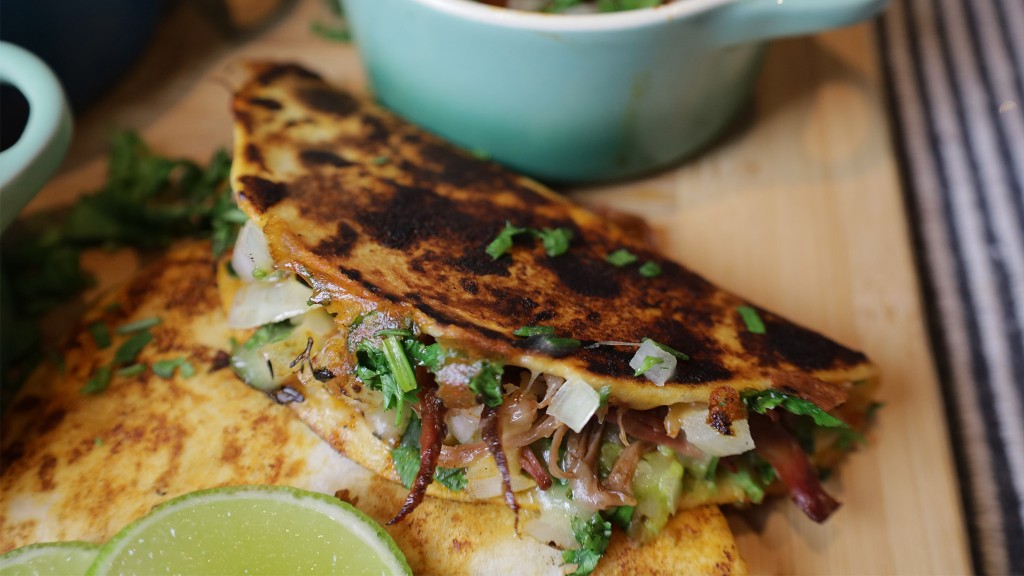 birria tacos on a wooden board