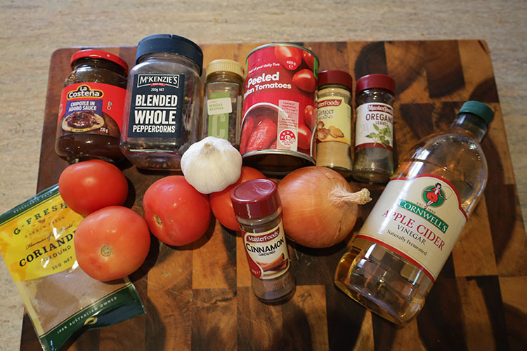 consomme ingredients on a wooden board