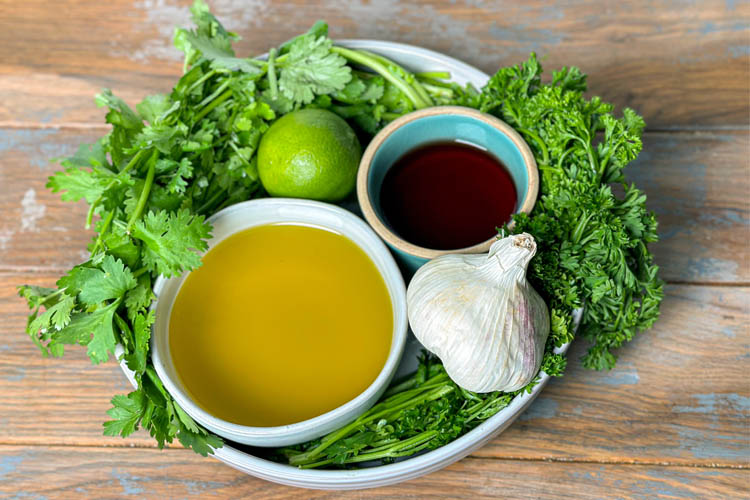 chimichurri ingredients on a white plate