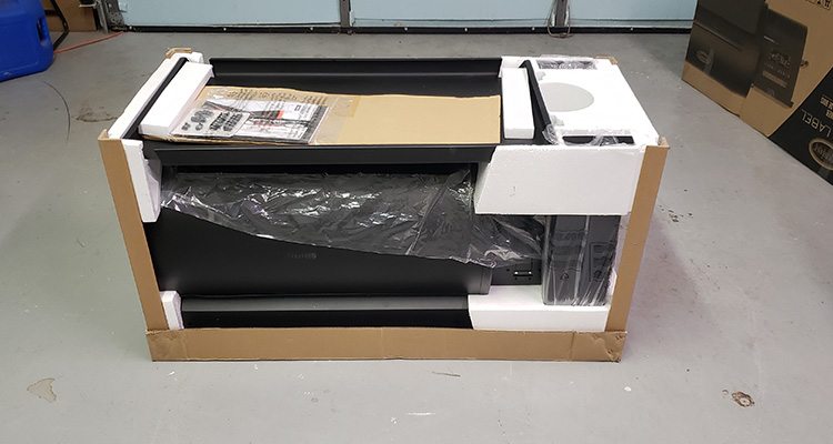 louisiana grills black label pellet grill packaged in a cardboard box