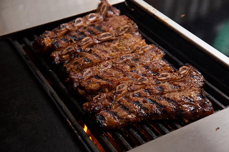 grilled korean bbq ribs on a flat top grill