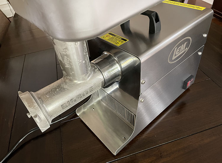 LEM Big Bite grinder on a wooden table