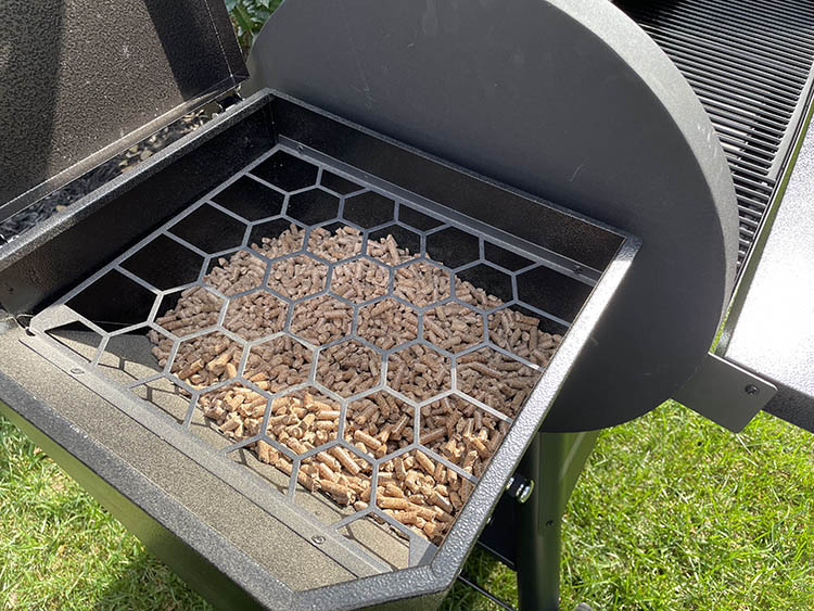 pellet hopper filled with wood pellets