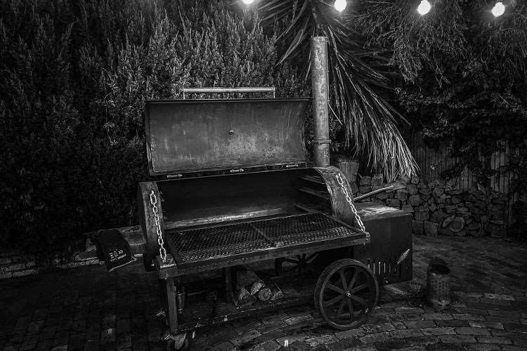homebuilt smoker in black and white