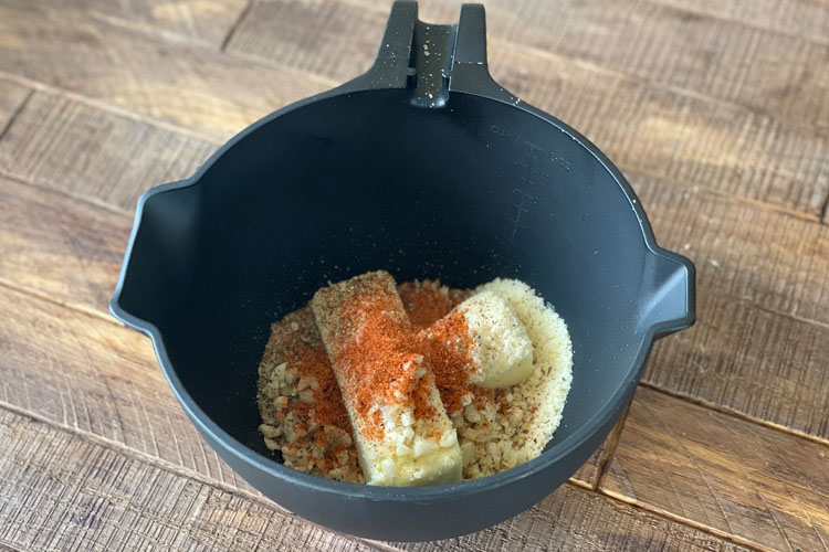 sauce ingredients in a black cast iron pot