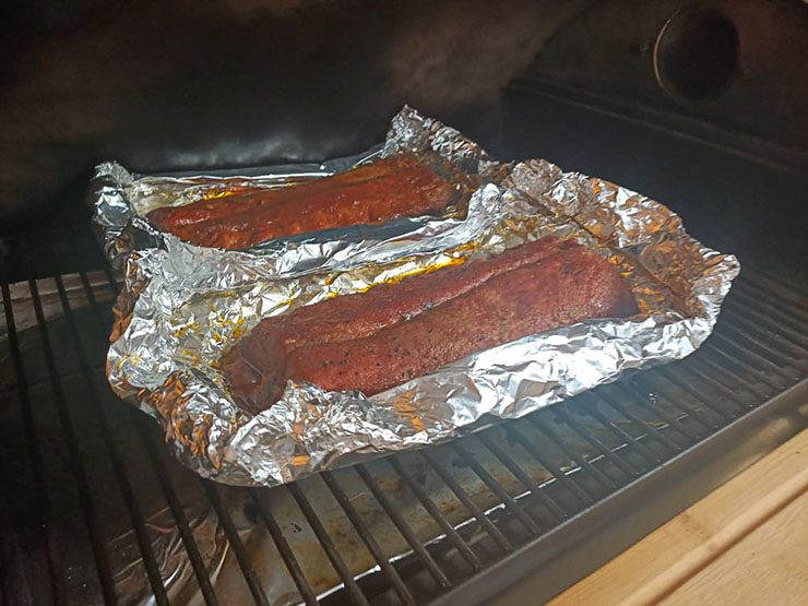 smoked baby back ribs on a pellet grill