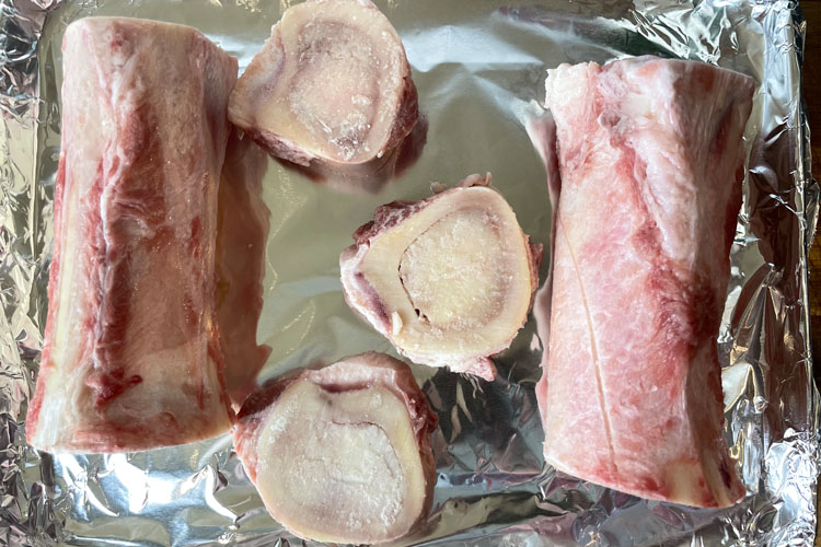 raw bone marrow on a foil lined tray