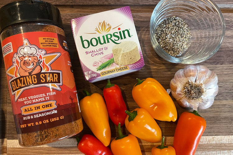 peppers and stuffing ingredients on a tray