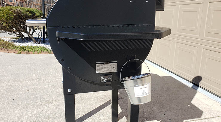 Camp Chef DLX 24 side view with grease bucket