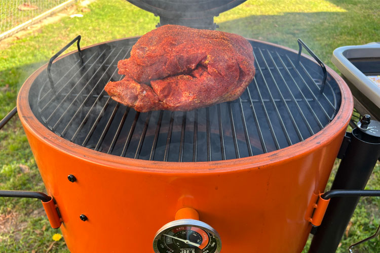 seasoned pork butt on smoker