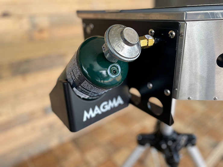 A side view of the Magma Crossover grill gas mount with propane cylinder