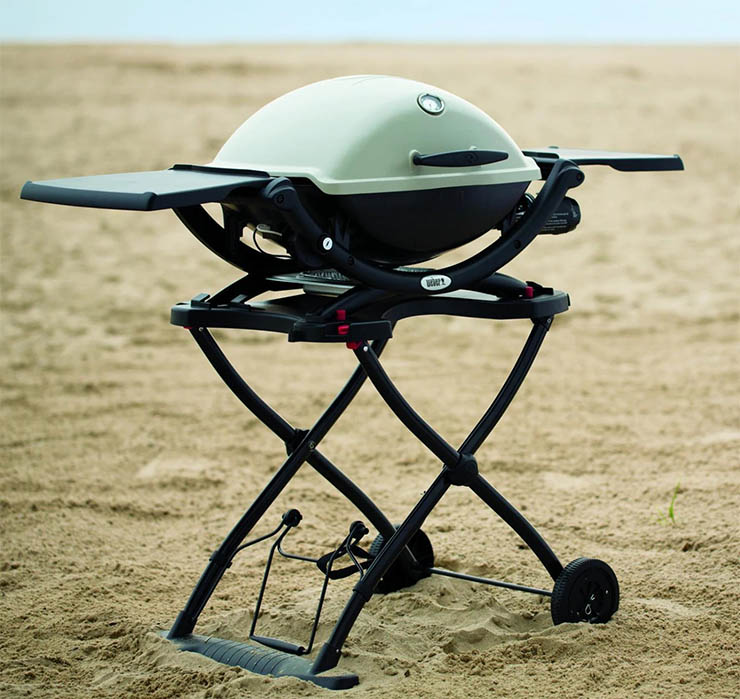 weber Q2200 gas grill on a portable cart