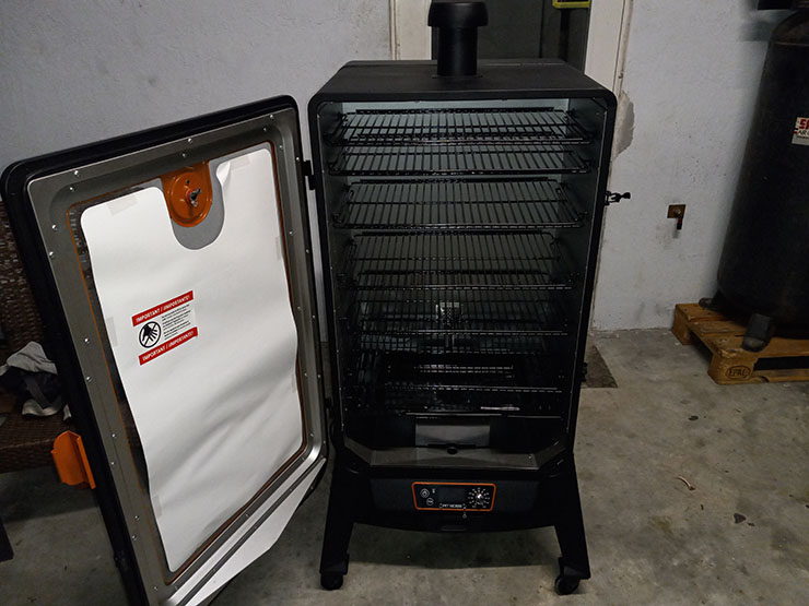 Pit Boss Sportsman 7-Series Vertical Pellet Smoker with an open door
