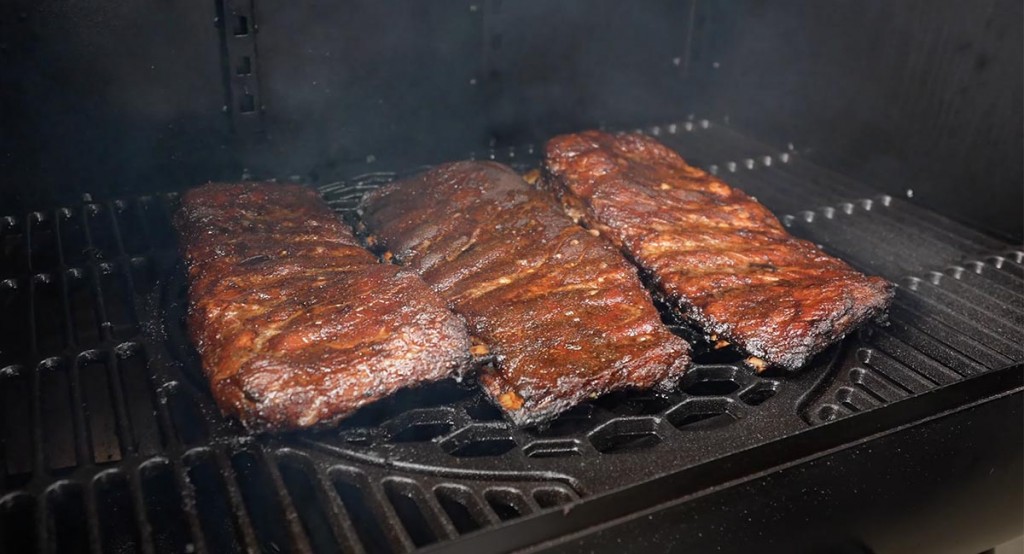 pork ribs smoking on the Oklahoma Joe's Rider DLX 1200 pellet grill