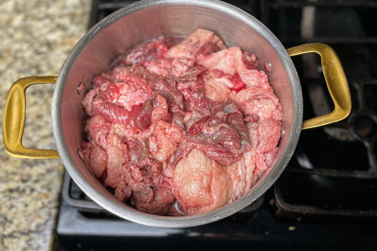 raw fat in a stock pot