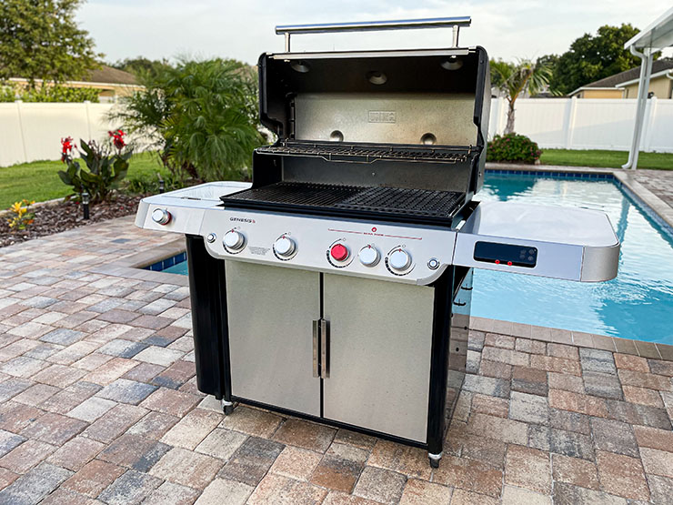 Weber Genesis SPX-435 gas grill with an open lid