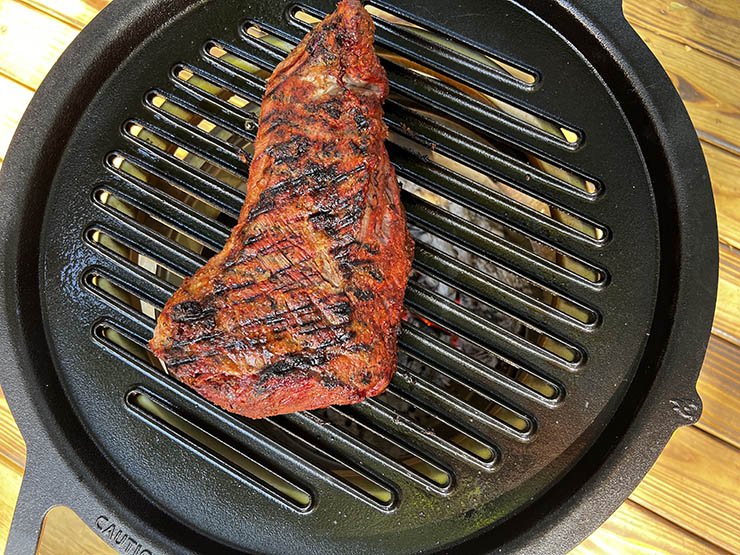 steak cooking on Solo Stove Bonfire 2.0
