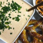 smoked beer cheese dip in a white bowl