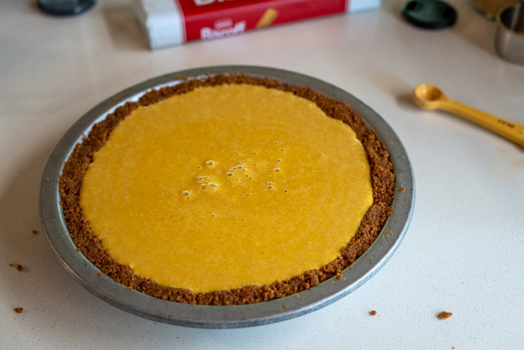 uncooked pumpkin pie ready for the smoker