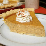 a piece of pellet smoked pumpkin pie on a white plate