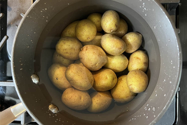 potatoes in a pot of water