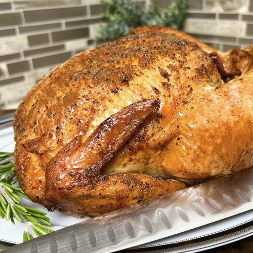 Whole smoked orange herb roasted chicken