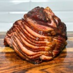 double smoked spiral ham on a wooden board