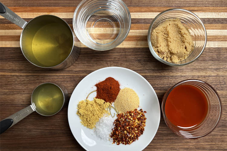 east carolina mop sauce ingredients on a wooden board