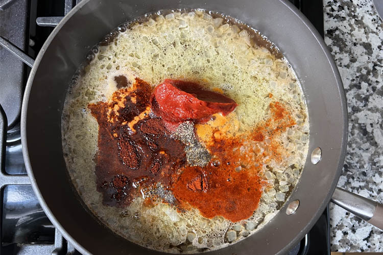 texas-style sauce ingredients in a pan