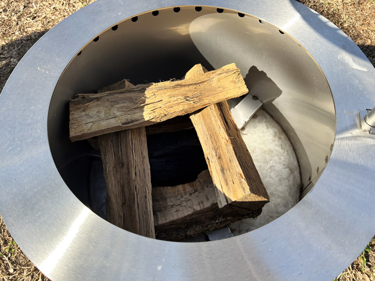 wood logs inside the Breeo Y Series fire pit