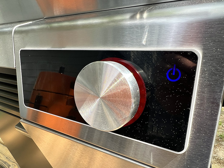 a close up view of the Char Broil temperature controller knob