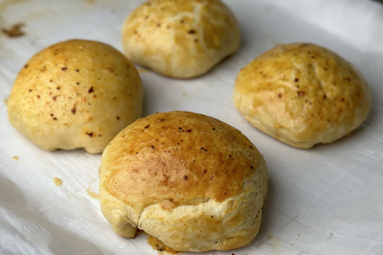 cooked biscuits on a white board