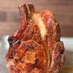 pellet smoked rack of pork on a metal tray